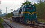 Diesel loc 664-111 is running through Maribor-Tezno on the way to Studenci station. 10.9.2013