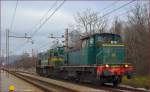 Diesel locs 642-185 + 664-110 are running through Maribor-Tabor on the way to Tezno yard. /22.1.2014