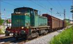 Diesel loc 642-179 pull freight train through Maribor-Tabor on the way to Tezno yard.