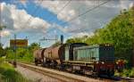 Diesel loc 642-179 pull freight train through Maribor-Tabor on the way to Maribor station. /12.5.2014