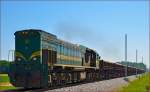 Diesel loc 664-115 pull freight train through Cirkovce-Polje on the way to Pragersko. /10.6.2014