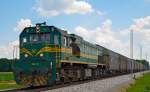 Diesel loc 664-112 pull freight train through Cirkovce-Polje on the way to Koper port. /19.6.2014