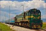 Diesel loc 664-115 pull MV247 'Citadella' through Cirkovce-Polje on the way to Budapest.