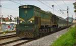 Diesel loc 664-106 pull MV247 'Citadella' through Maribor-Tabor on the way to Budapest. /19.8.2014