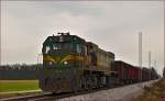 Diesel loc 664-106 pull freight train through Cirkovce-Polje on the way to Pragersko. /29.1.2015