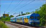 Multiple units 711-003 are running through Maribor-Tabor on the way to Maribor station. /21.5.2014