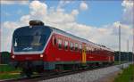 Multiple units 814-119 run through Cirkovce-Polje on the way to Maribor.