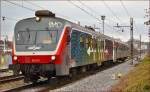 Multiple units 813-121 run through Maribor-Tabor on the way to Ormož.