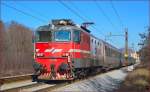 Electric loc 342-025 is hauling EC151 ဘEmonaမ through Maribor-Tabor on the way to Ljubljana. /13.1.2014
