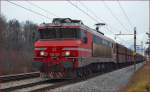 Electric loc 363-015 is hauling freight train through Maribor-Tabor on the way to Koper port. /20.1.2014