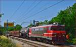 Electric loc 363-011 pull freight train through Maribor-Tabor on the way to the north.