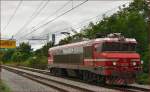 Electric loc 363-038 run through Maribor-Tabor on the way to Maribor station. /13.8.2014