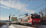 Electric loc 363-012 pull freight train through Maribor-Tabor on the way to the north.