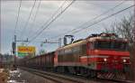 Electric loc 363-004 pull freight train through Maribor-Tabor on the way to the north. /9.1.2015