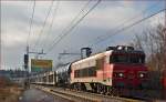 Electric loc 363-027 pull freight train through Maribor-Tabor on the way to the north.