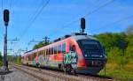 Electric multiple units 312-136 is running through Maribor-Tabor on the way to Maribor station.