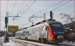 Multiple units 312-123 are running through Maribor-Tabor on the way to Maribor station. /7.2.2014