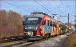 Multiple units 312-108 are running through Maribor-Tabor on the way to Maribor station. /2.1.2014