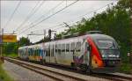 Multiple units 312-123run through Maribor-Tabor on the way to Maribor station.