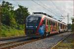 Multiple units 312-140 run through Maribor-Tabor on the way to Maribor station. /22.9.2014