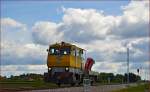 Rail crane TMD-46 is running through Šikole on the way to Pragersko. /14.5.2014