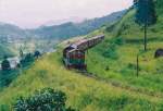 Henschel Thyssen Class M6 locomotive heading to Badulla is negotiating the S curve in Rozalla incline just before the station in Sep 2012.