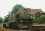 Henschel Thyssen Class M6 - 786 ready for departure out of Demodara on the way to Badulla. A discarded goods wagon ( the black color object) mount on the side of the platform  which is now been used for storage is visible in the picture.