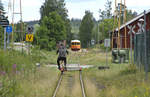 Arriving on a draisine at the station in Vimmerby in South Sweden. The draisines can be hired in Virserum and Åseda at the end of the narrow gauge line. Date: 1. July 2017.