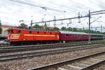Museum trains won't  come much more rare than this one: retro liveried TGOJ Ma 405 stands with two Swiss museum coaches at G�vle station on 12 September 2015. This was the result of a one-off cooperation betweenthe Swedish Railway Museum G�vle, TGOJ  ...