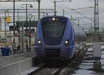 X61 013 of Skänetrafiken enters Malmö Central on 17 February 2026.
