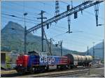 The SBB Cargo engine Am 843 056-3 is running through the station of Brig on May 25th, 2012.