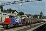 Am 843 071-2 is hauling a goods train through the station of Spiez on July 31st, 2008.