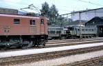 Ae 3/6 II 10349; Ae 4/7 no 11006 and annother Ae 4/7 at Olten, August 15th, 1980; Showing the engines of the depot Olten by an expert to a group of railway enthusiast.