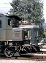 Front of Ae 4/7 no 11012 and BDe 4/4 at Olten, August 15th, 1980; Showing the engines of the depot Olten by an expert to a group of railway enthusiast.