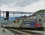 The SBB Cargo Ae 610 492-1 is hauling a freight train through the station of Spiez on May 22nd, 2012.
