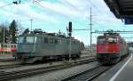 A green Ae 6/6 (N 11444) and a red one (n 114641) in Langenthal.