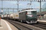 Ae 6/611402 banks a freight out of Erstfeld on 4 June 2014.