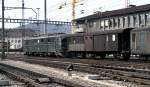 Ae 6/6 with post and express goods train at Olten, August 15th, 1980.