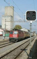 Ae 6/6 with a Cargo train in Moudon.