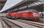 The SBB Aem 940 019 (Aem 91 85 4 940 019-3 CH-SBBI) and a SBB Re 460 in Lausanne.