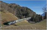 The BLS Re 4/4 II 501 with his RE on the way from Spiez to Zweisimmen on the Bunschenbach Bridge by Weissenburg. 

12.01.2020 