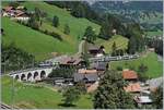 The BLS Re 4/4 II 502 with his RE to Interlaken Ost by Garstatt.