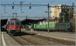 Re 4/4 II 11135 with a RE to Lausanne. In the backgroud an Ae 6/6.
Renens, 02.03.2012