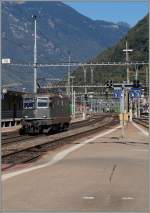 The green SBBRe 4/4 II 11309 in Bellinzona. 
23. 09.2014