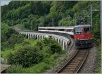 The SBB Re 4/4 11153 wiht an IR to Schaffhausen near Neuhausen am Rheinfall.