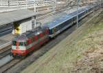 SBB Re 4/4 II 11109 in  Swiss Express  colours in La Chaux-de-Fonds.
28.11.2009