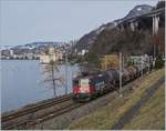 With the SBB Re 4/4 II 11276 (Re 420 276-8) at the front, a freight train is traveling towards St Triphon.