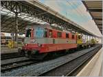 The  Swiss Express  Re 4/4 II 11108 in Lausanne.