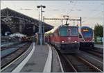 The SBB Re 4/4 II 11172 and an other one wiht the EN 200  Thello  in Lausanne.