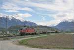 The SBB Re 420 273-5 with a Cargo train by Aigle .